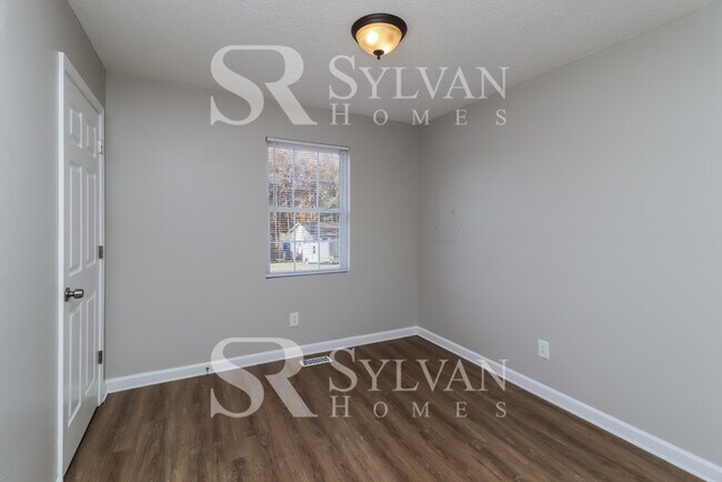 Building Photo - Bring more life and value to this charming home!