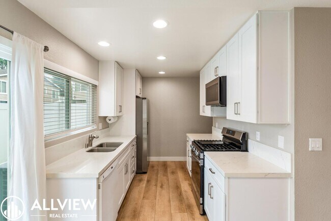 Building Photo - Two-Story Gem in Huntington Beach - Modern Upgrades & Private Outdoor Space