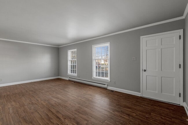 Building Photo - Large Brick Ranch, New Wood Like Flooring Throughout, Just Painted, LR, Den, Sun Room, Carport!