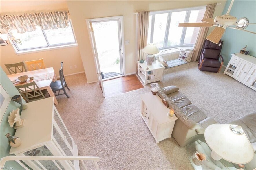 carpet has been removed and hardwood floors finished, painting in progress (shown in later pictures). - 301 Pepper Mill Ct