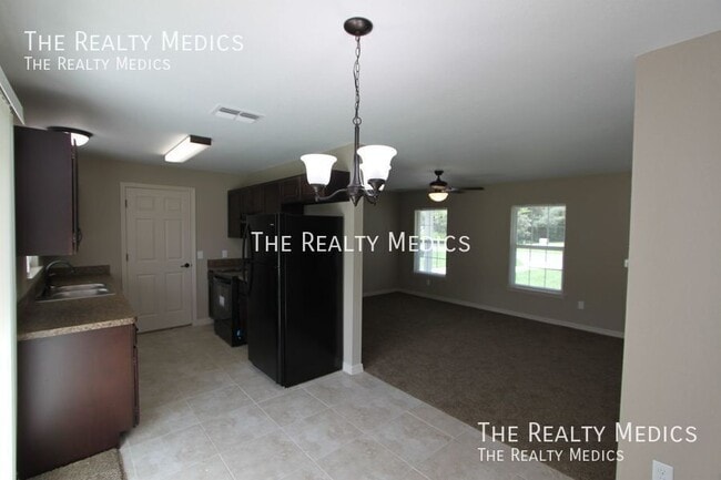 Building Photo - 15593 SW 48th Ave