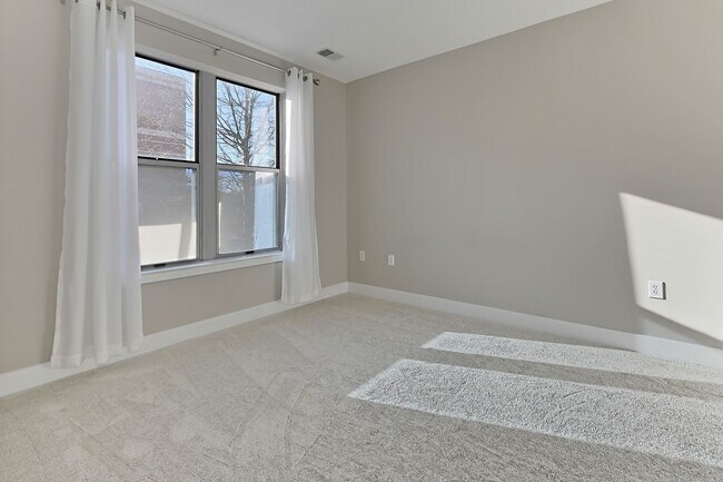 Building Photo - Unique Two-Level Condo