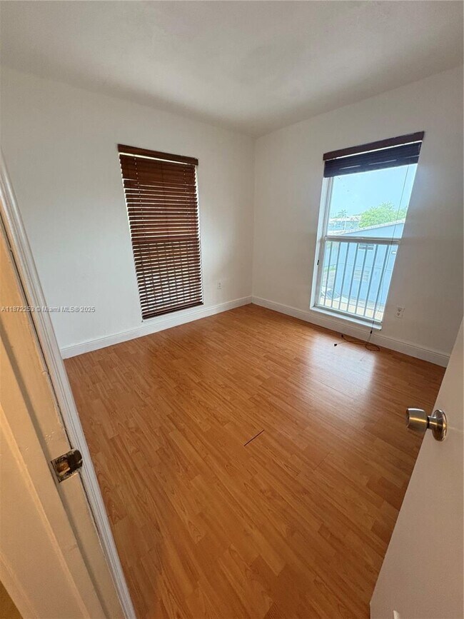 Building Photo - 241 S Royal Poinciana Blvd