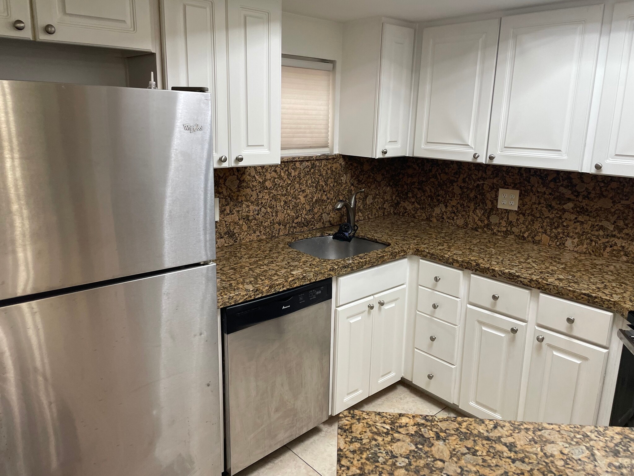Kitchen with marble countertop - 8215 Lake Dr