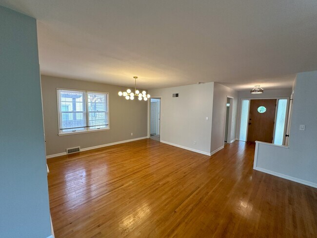 View of dining room and entryway from living room - 5819 Blueridge St