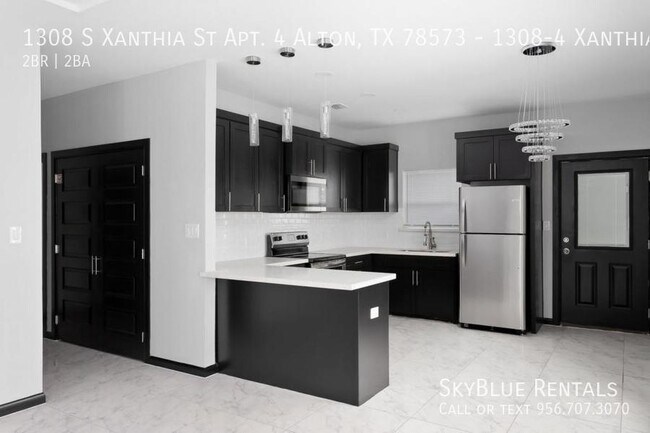 Building Photo - 1308 S Xanthia St