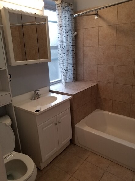 Building Photo - 1303 W Pratt Blvd