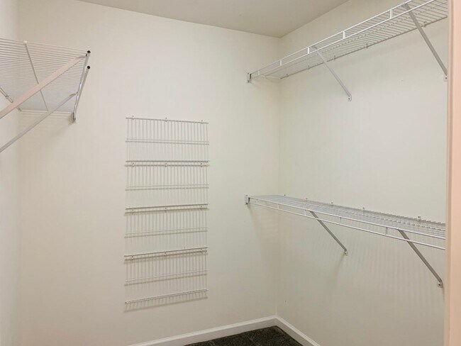 Building Photo - Great location! Lawncare/water is included...