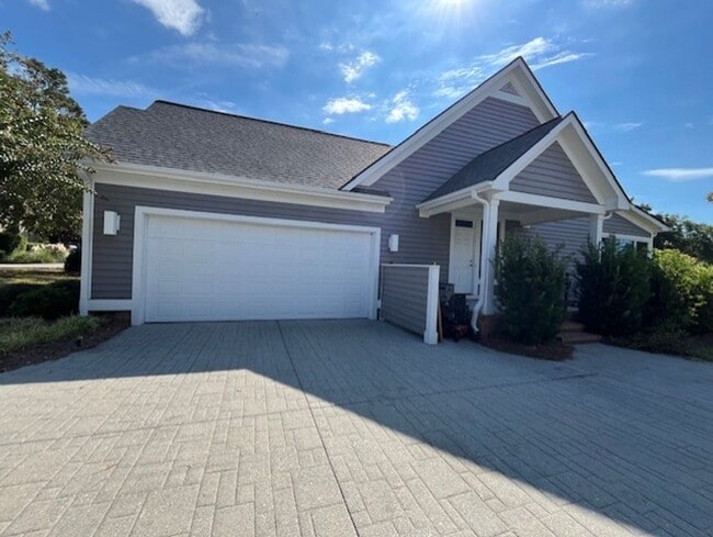 Building Photo - Welcome to Elegant Living in the Charming Porters Neck Plantation Community!