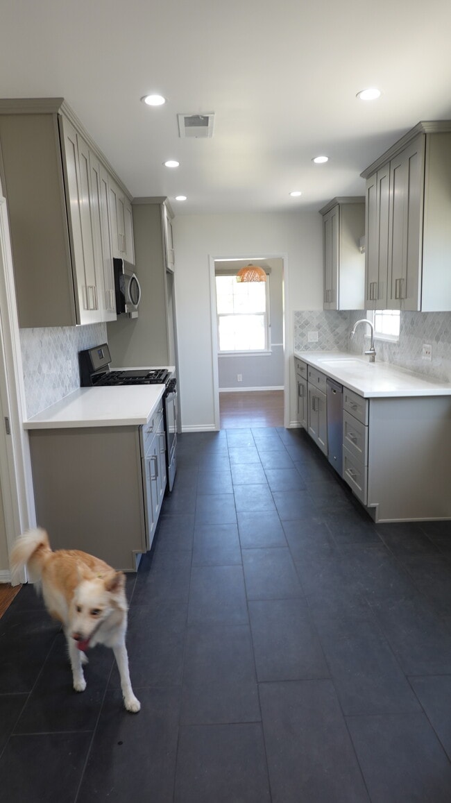 newer kitchen with quartz counters - 4715 Allott Ave