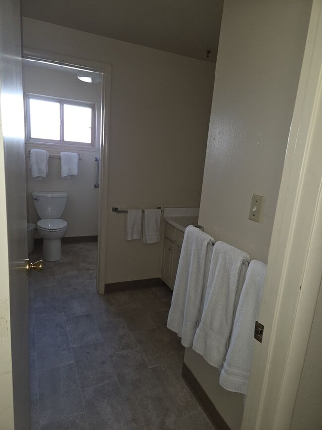 Building Photo - Unique open design,wood beams in all rooms-Very cheery and cozy. Newly remodeled, and newly furni...