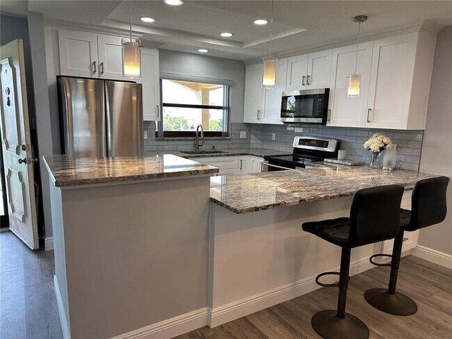 Building Photo - 12500 Capri Cir N