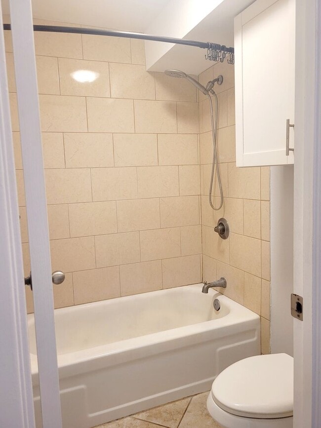 Building Photo - AVAILABLE | 2 Bedroom, 1 Bathroom Condo with 1 Assigned Parking Stall