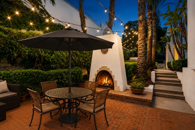 Building Photo - Beautifully Remodel Townhouse with AC & Two Car Garage!