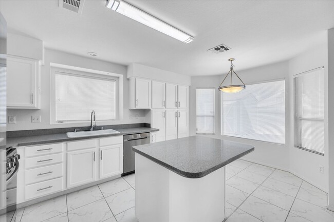 Building Photo - SE!!  Windmill and 215!! Newly remodeled!! All Tile Floors down stairs!! Low Maintenance Desert L...