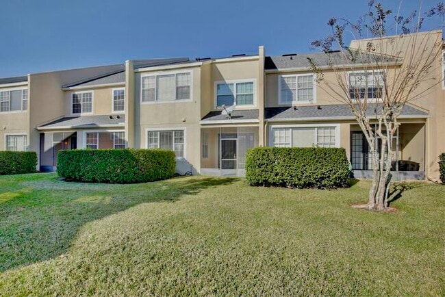 Building Photo - Spacious 4/2.5 Townhome in Gated Community in Avalon Park - Orlando