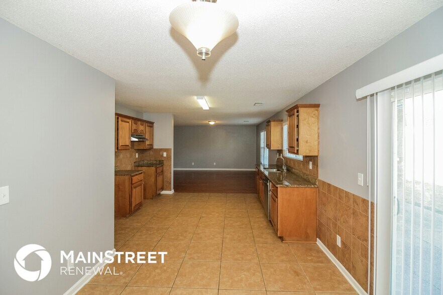 Building Photo - 10056 Chariden Dr