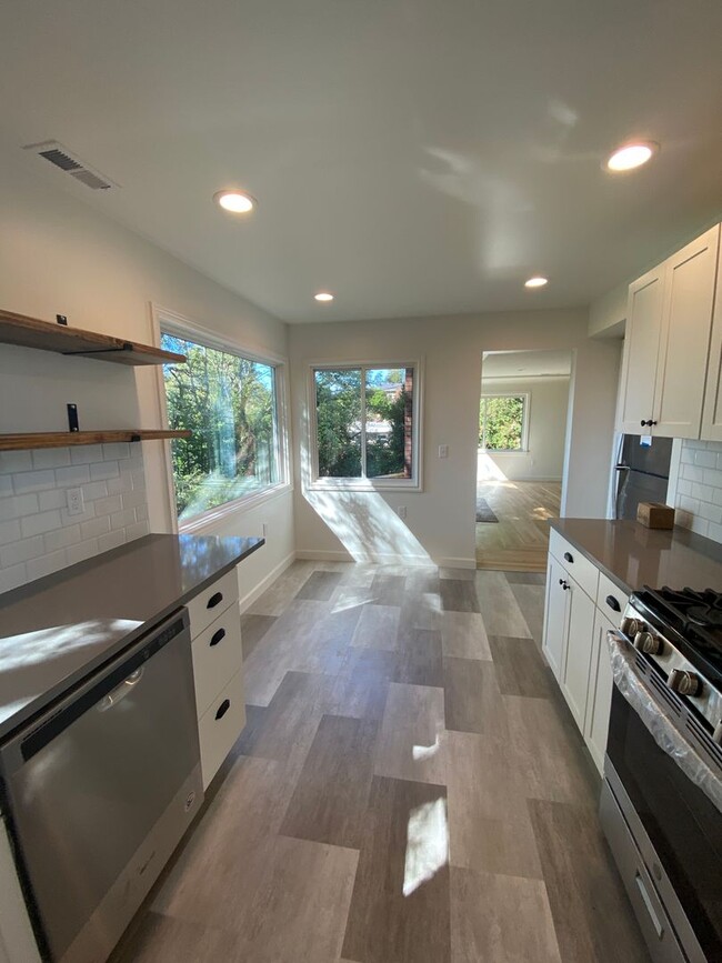 Building Photo - Remodeled Seattle Home on a corner lot, Av...