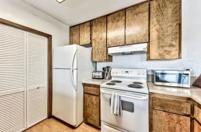 Building Photo - Available for long- or short-term rent. Available now.