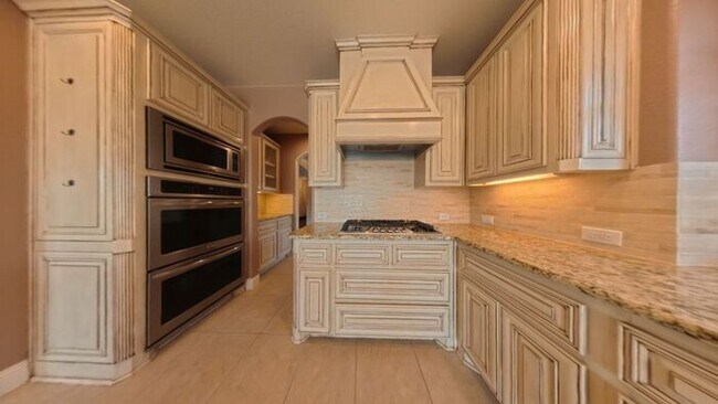 Building Photo - Immaculate 4-Bedroom Home with Luxury Upgr...
