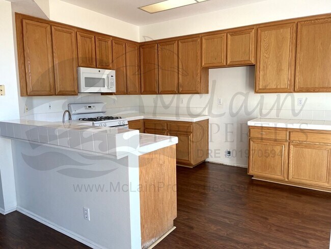 Building Photo - RE: Spacious End-Unit Townhome in Gated Chapala Community, Eastlake