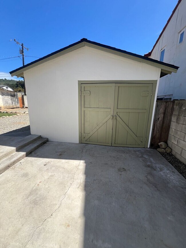 Building Photo - CHARMING! Remodeled 2 Bedroom home with storage and yard
