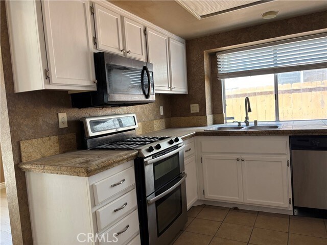 Building Photo - 7634 Plumaria Dr