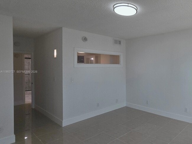 Building Photo - 19380 Collins Ave