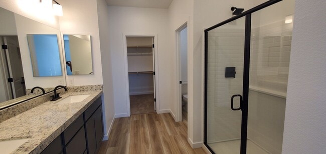 Building Photo - Beautifully designed modern townhome with attached garage.