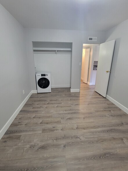 Bedroom closet includes washer/dryer - 3663 S Sheridan Blvd