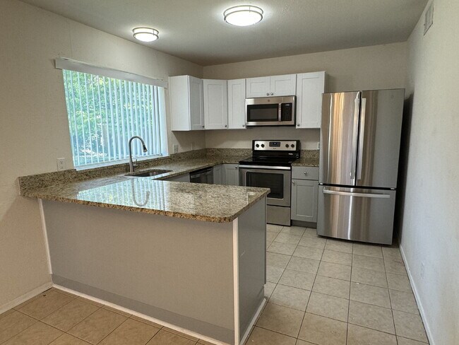 Building Photo - Beautifully Remodeled 2-Story Home with Primary Suite Downstairs – Move-In Ready!