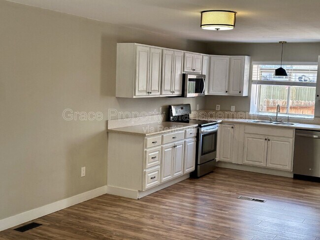 Building Photo - 9616 W Chatfield Ave