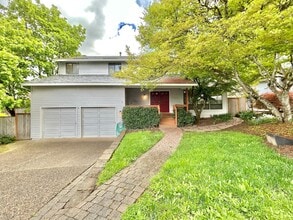 Building Photo - Large 4 Bed, 2.5 Bath House! Landscaping Included!