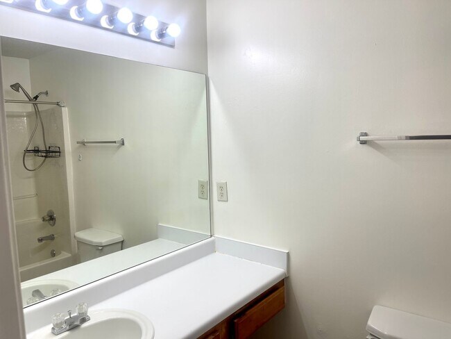 Building Photo - Welcome to this stunning 2-bedroom, 2.5 bathroom corner townhome located in the vibrant city of A...