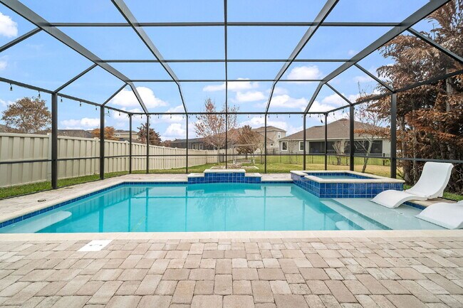 Building Photo - 4BR, 2.5BA home with resort style outdoor living!