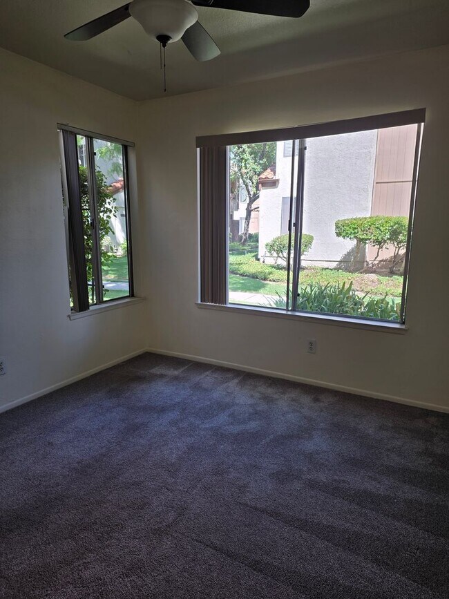 Building Photo - Sharp one level 3-bedroom 2 bath condominium which features two patios. Many amenities.
