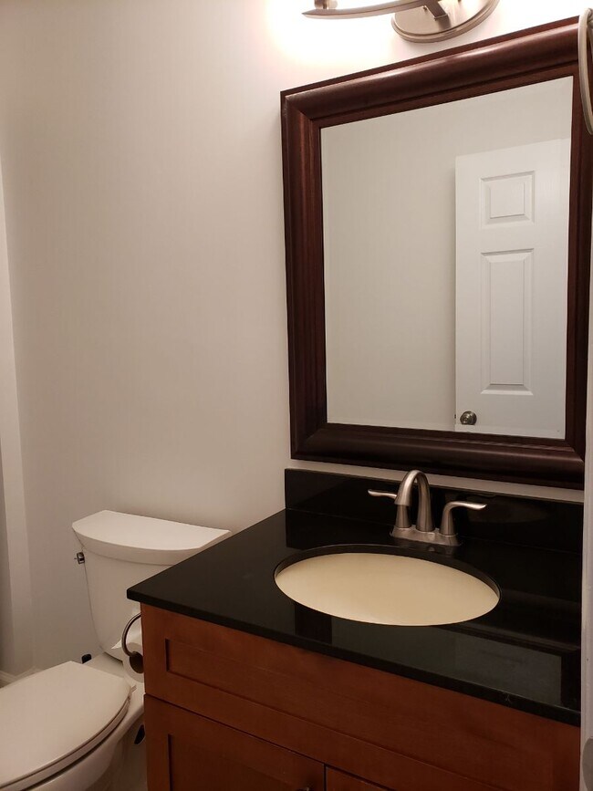 Down stairs half bath - 7594 Courtyard Run W