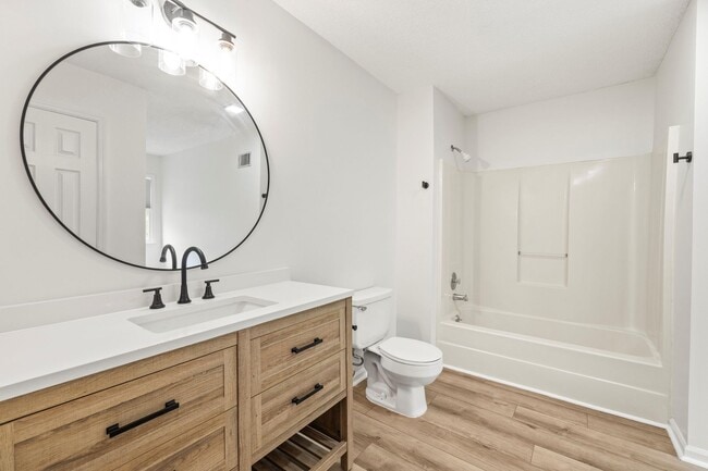 Building Photo - Renovated Home on Large Corner Lot in Coveted Strathy Hall