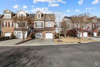 Building Photo - Spacious 3-Story End-Unit Townhouse Condo