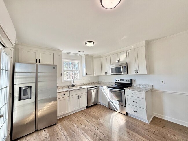 Building Photo - Newly Remodeled 3BD, 2BA Wake Forest Home on a Large, Private Lot with a Bonus Room and a Fenced ...