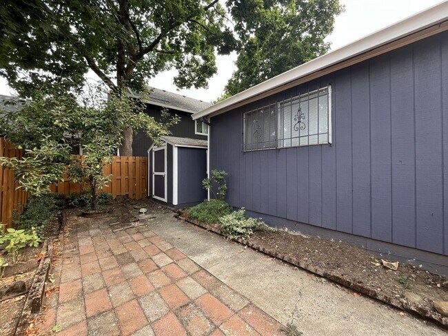 Building Photo - Single-Level 3-Bedroom Home with 2-Car Garage, Mini-Split AC, & Backyard Garden Space