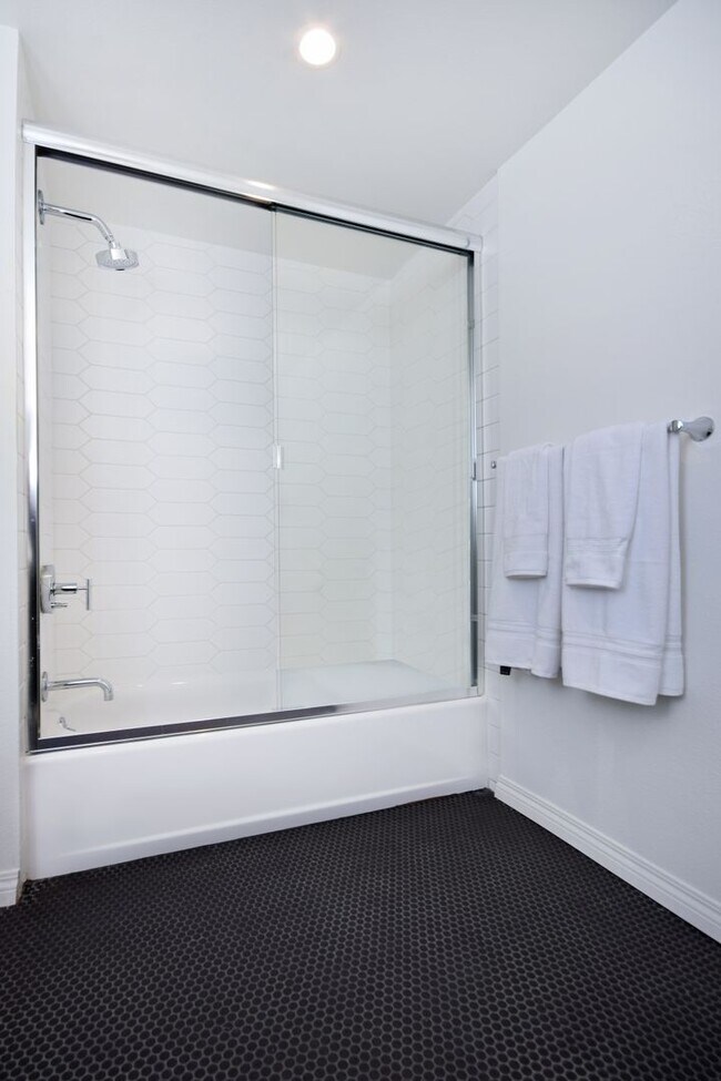 Building Photo - ~ 4 Bedroom 4 Bathroom Washer and Dryer in Unit Gated parking with EV Charging