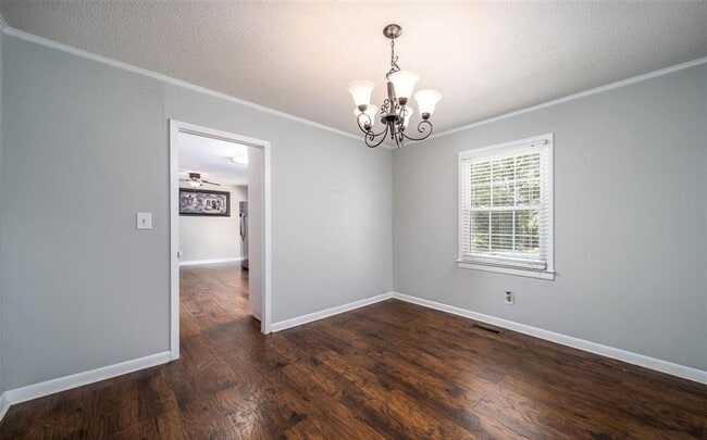 Building Photo - 4 bed & 2.5 bath with a pool
