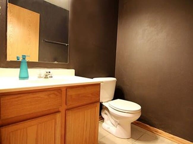 Building Photo - Great NE location -  4 bedroom 2.5 bath with attached 2 stall garage. Close to shopping & restaur...