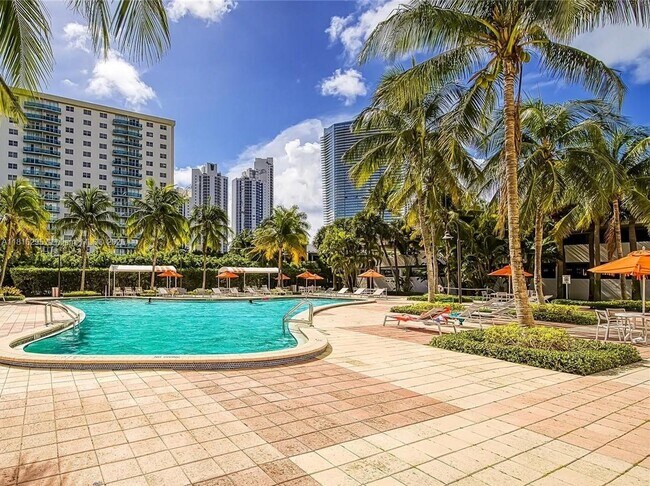 Building Photo - 19380 Collins Ave