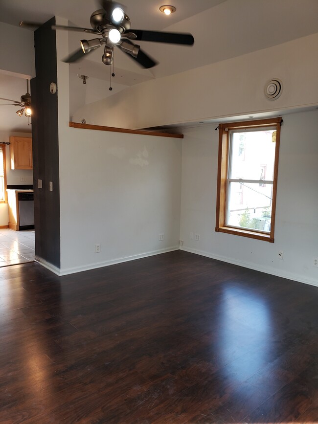 living room with vaulted ceilings - 2235 N 1st St