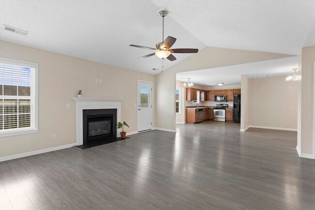 Building Photo - House with Fenced Back Yard Available!