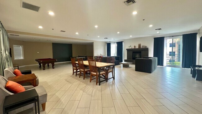 Building Photo - Top Floor Sweet and Spacious studio with resort style amenities and In-Unit Washer & Dryer!