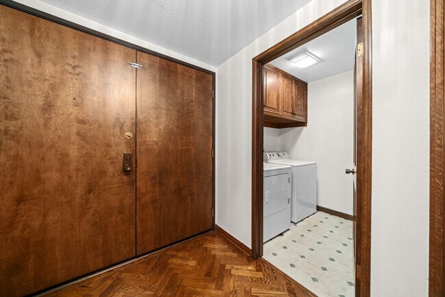 Building Photo - Elegant Corner Condo with Spacious Interiors
