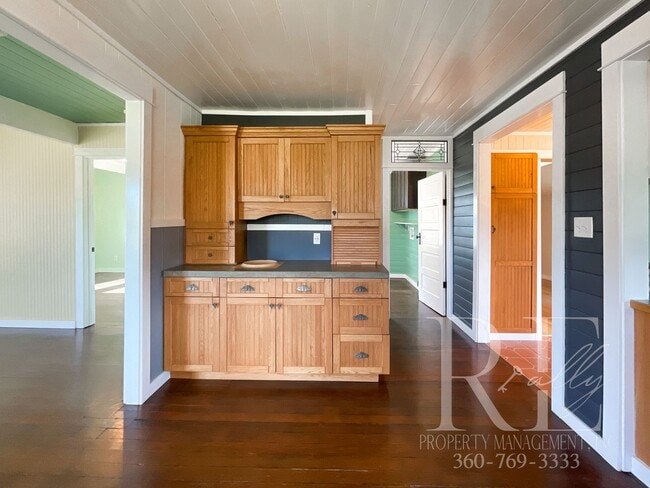 Building Photo - Whimsical Craftsman with Wraparound Porch, Bonus Room & Liberty Bay Peek Views